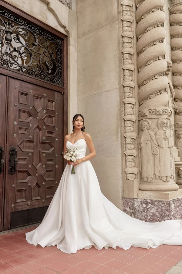MODERN LUXE STRAPLESS BALLGOWN WEDDING DRESS WITH LEG SLIT